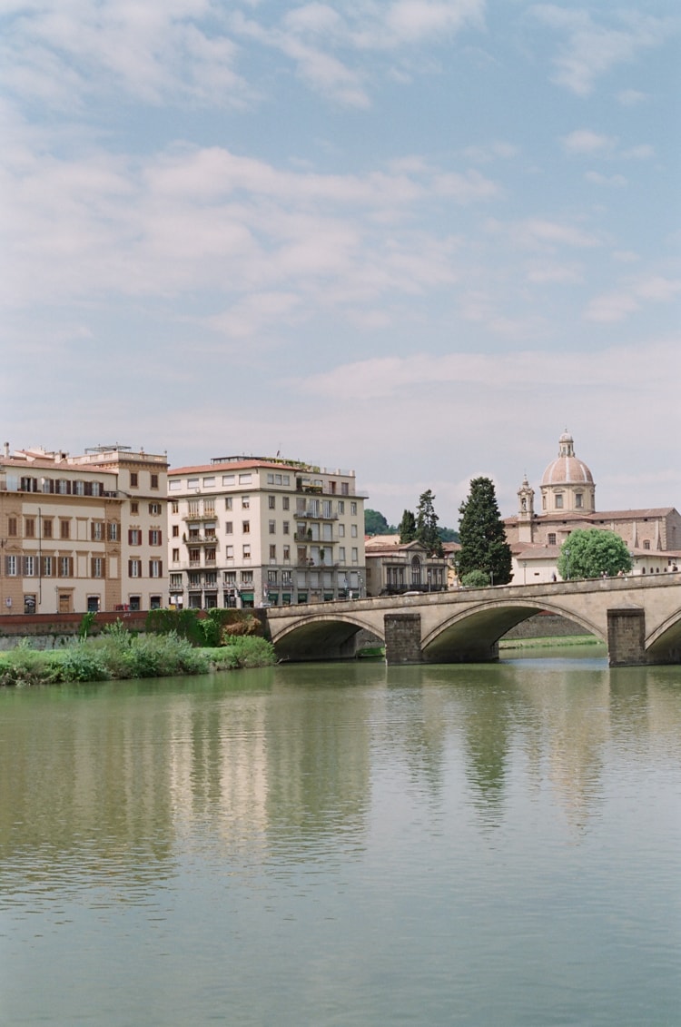 River Arno depicted with a bridge in Florence with the Cathedral in sight in Italy