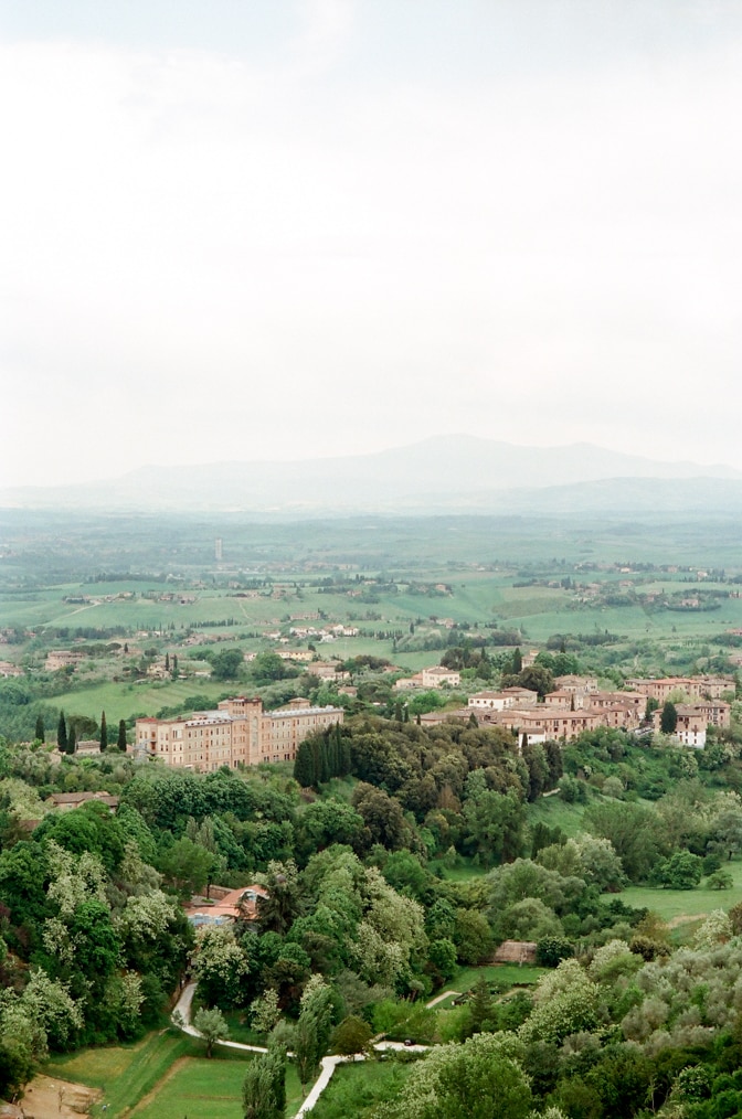 Aerial view of the city Siena in Italy with rolling hills in the background