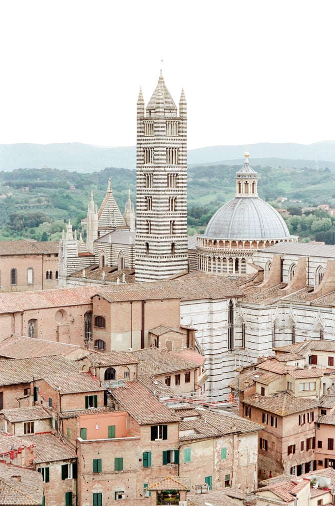 The Cathedral and its black and white marbled tower in Siena Italuy