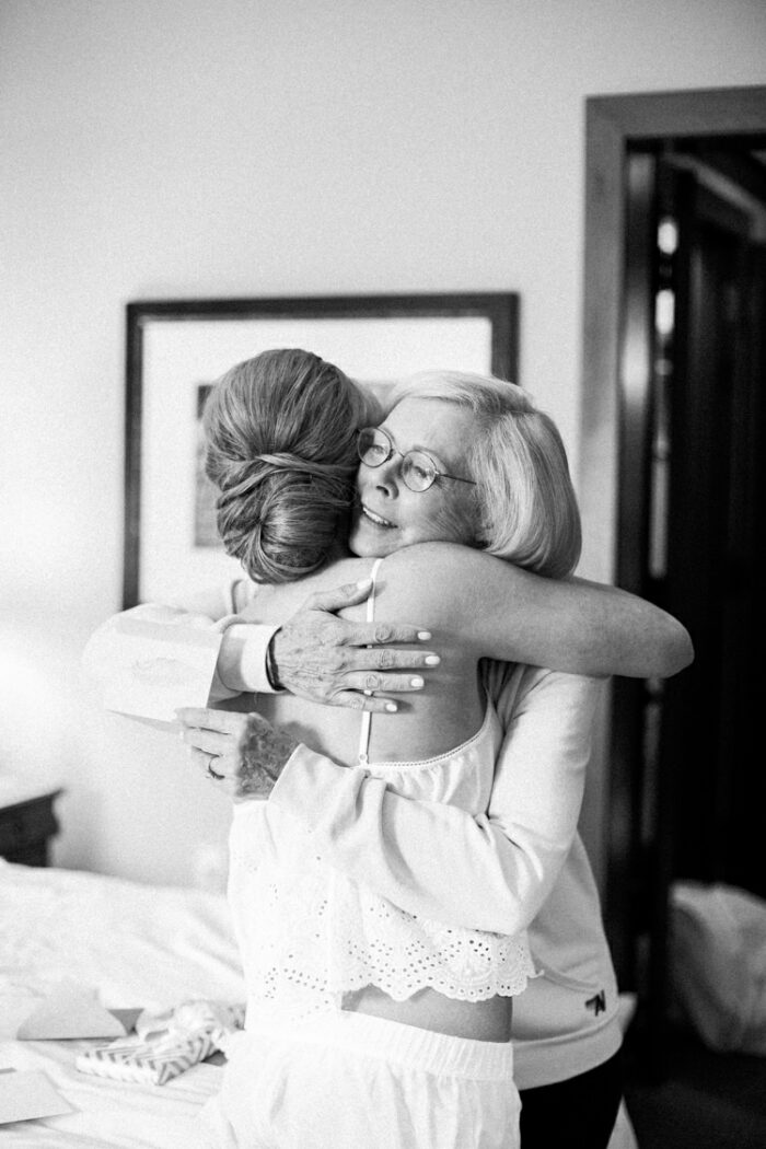 Bride embracing her mother during getting ready at Four Seasons in Vail