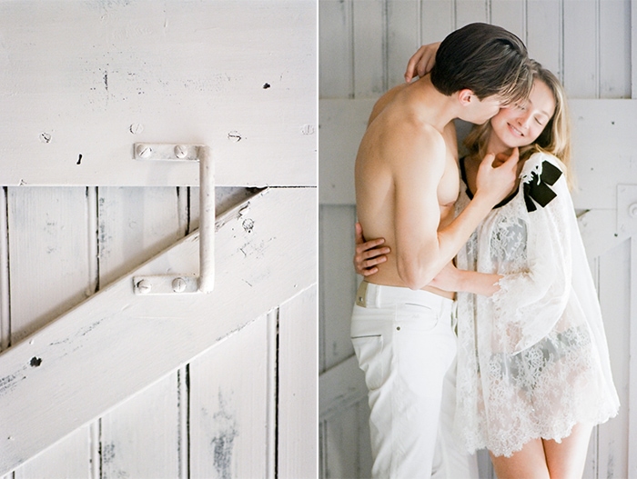 Bride and groom leaning on a white sliding door