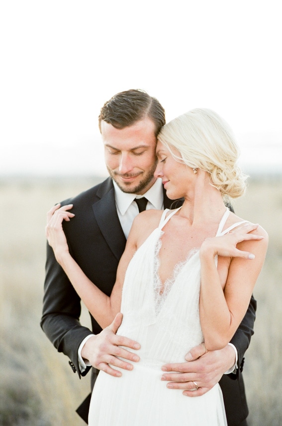Bride and groom embracing each other during their Marfa elopement