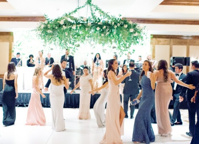 Wedding guests dancing on the dance floor at the Ritz Carlton Bachelor Gulch in Colorado