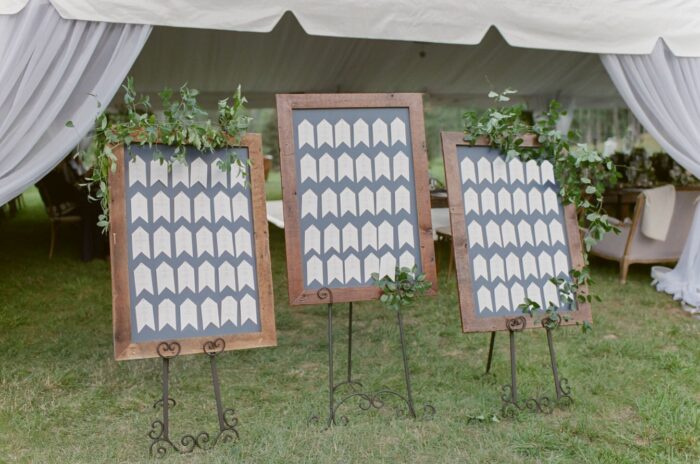 Name card boards in blue embellished with florals