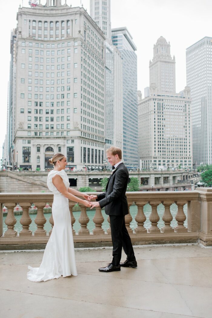 First look of Chicago bride and groom at Wrigley Building