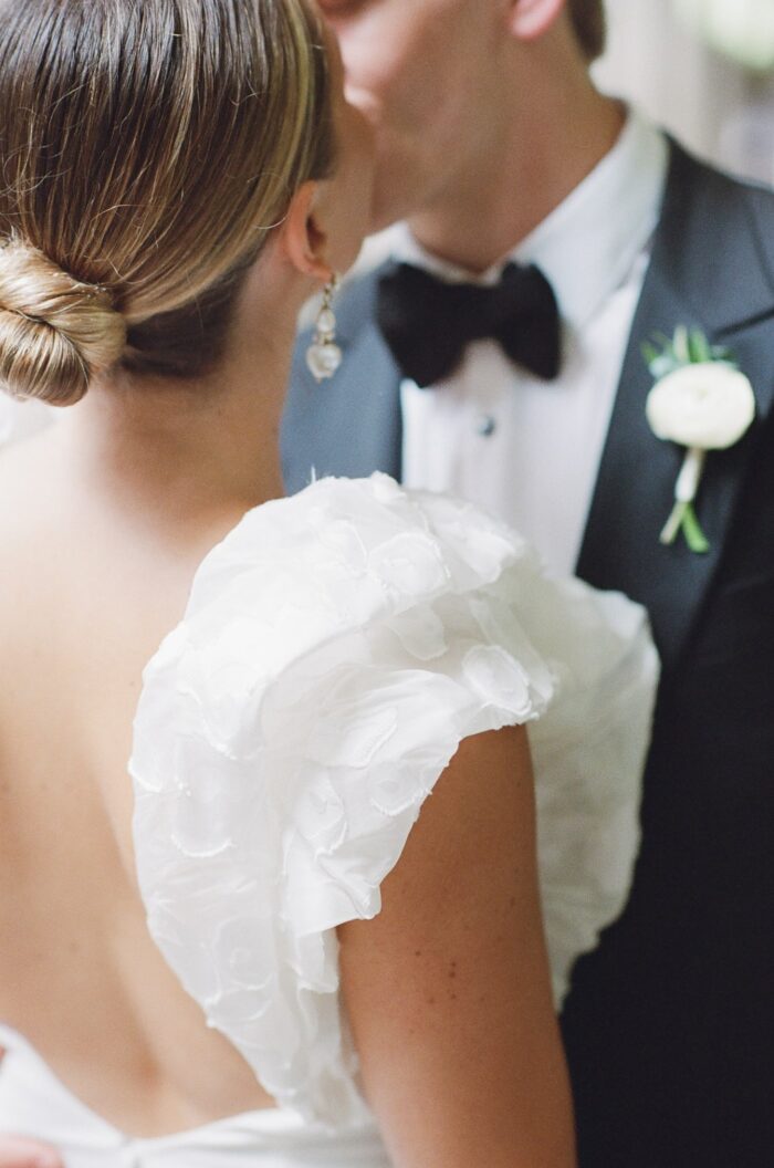Closeup of wedding gown sleeve of designer Rime Arodaky
