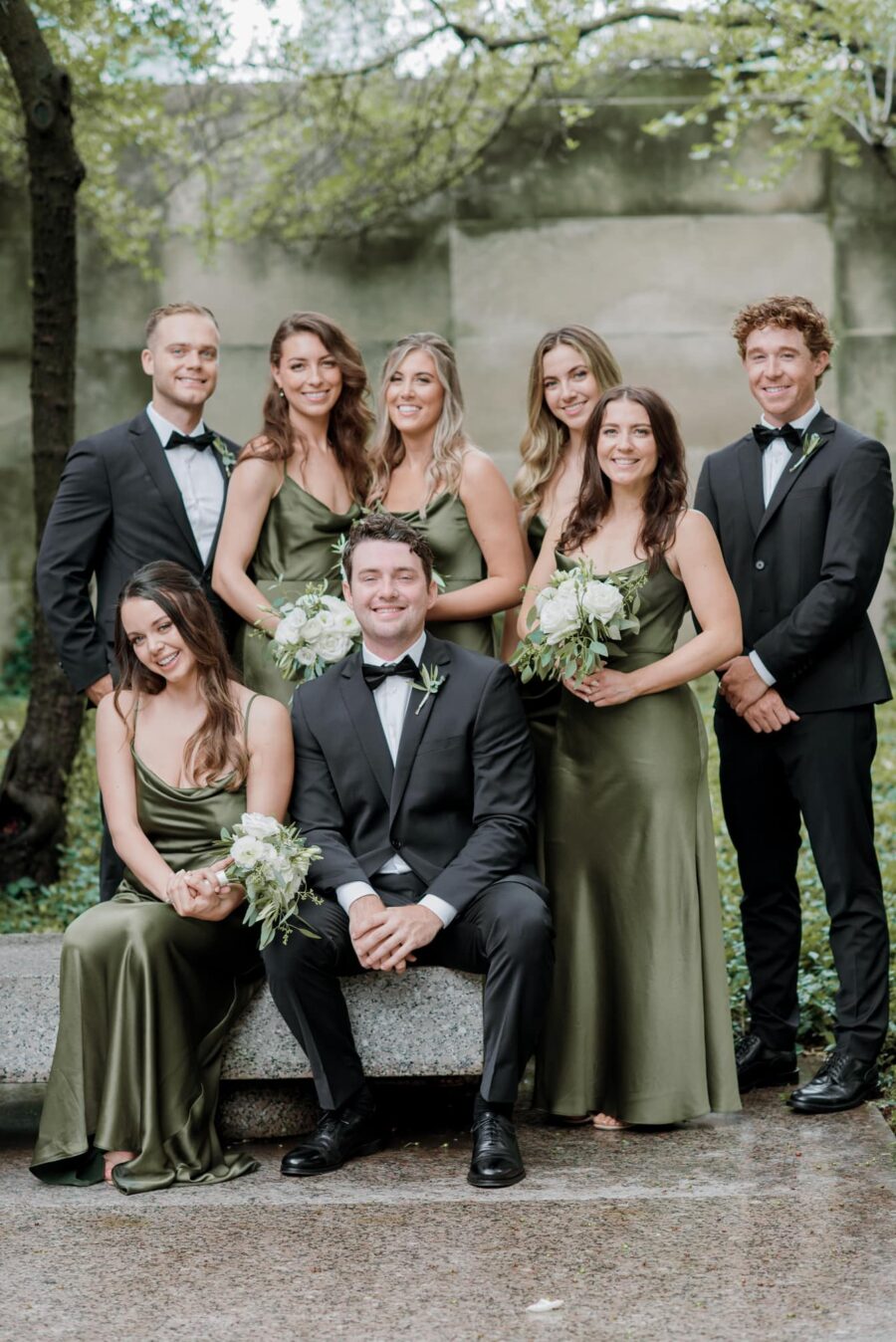 Wedding Party sitting at Chicago Art Institute Garden