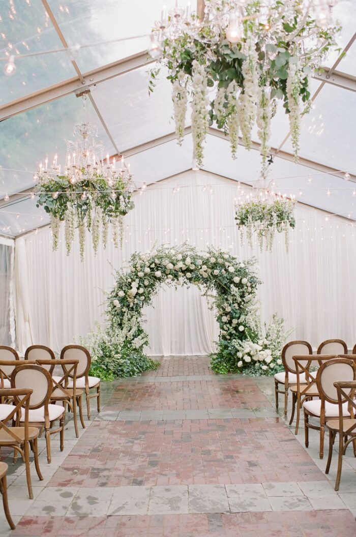 Floral wedding arch with white and green flowers at Chicago Illuminating Company