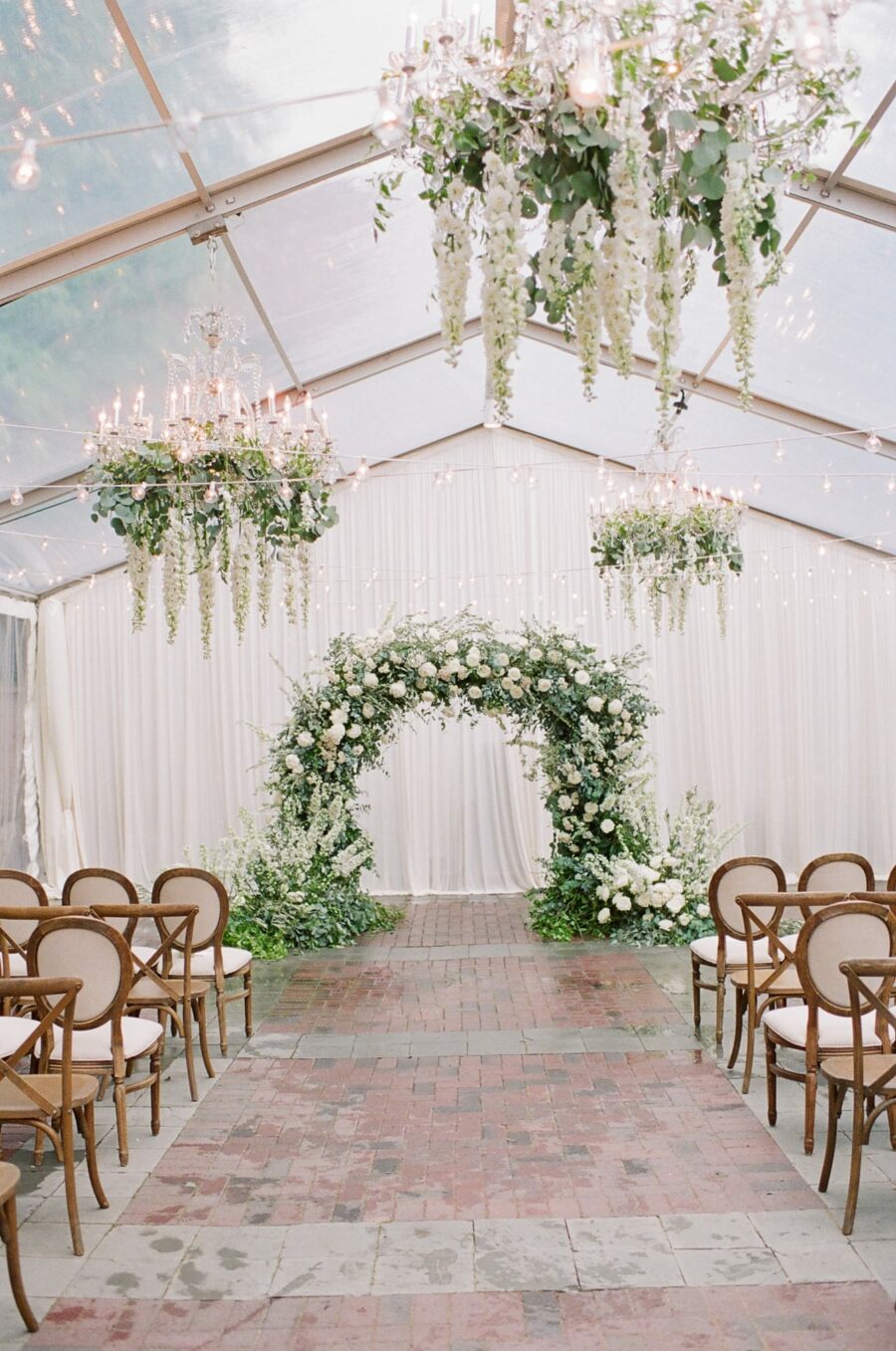 Floral wedding arch with white and green flowers at Chicago Illuminating Company