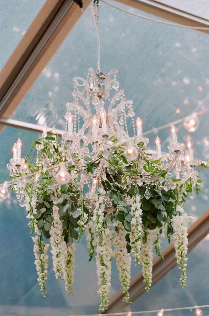 Chandelier adorned with whites and greens
