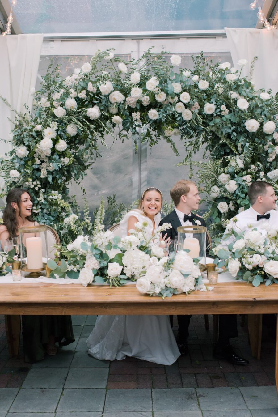 Bride and groom smiling during wedding reception