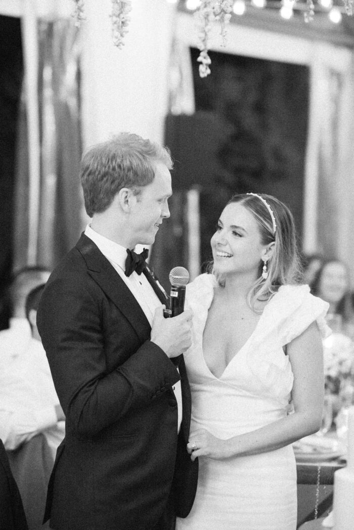 Bride and groom giving thanks to their wedding guests