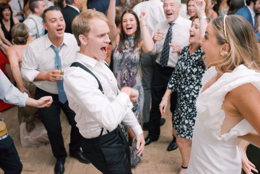 Bride and groom dancing with wedding guests at Chicago Illuminating Company