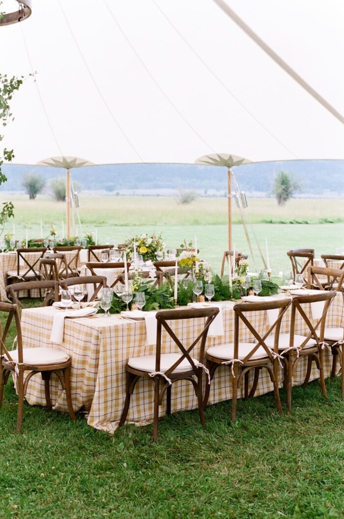 Yellow and green wedding theme at tented wedding