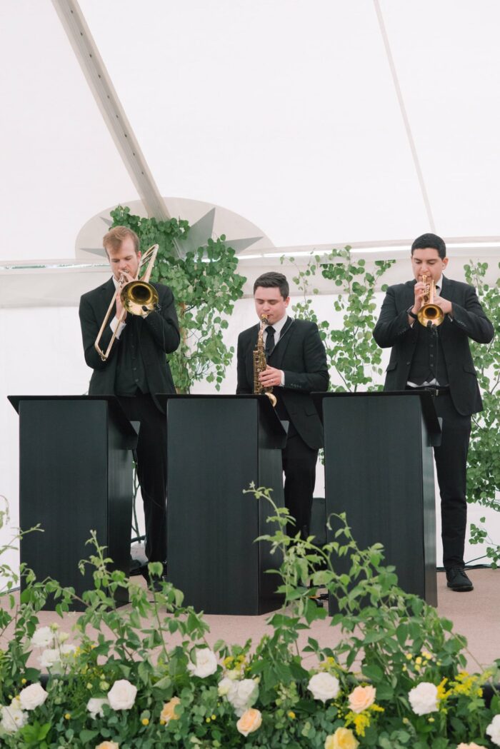 Jordan Khan orchesta playing at tented wedding reception
