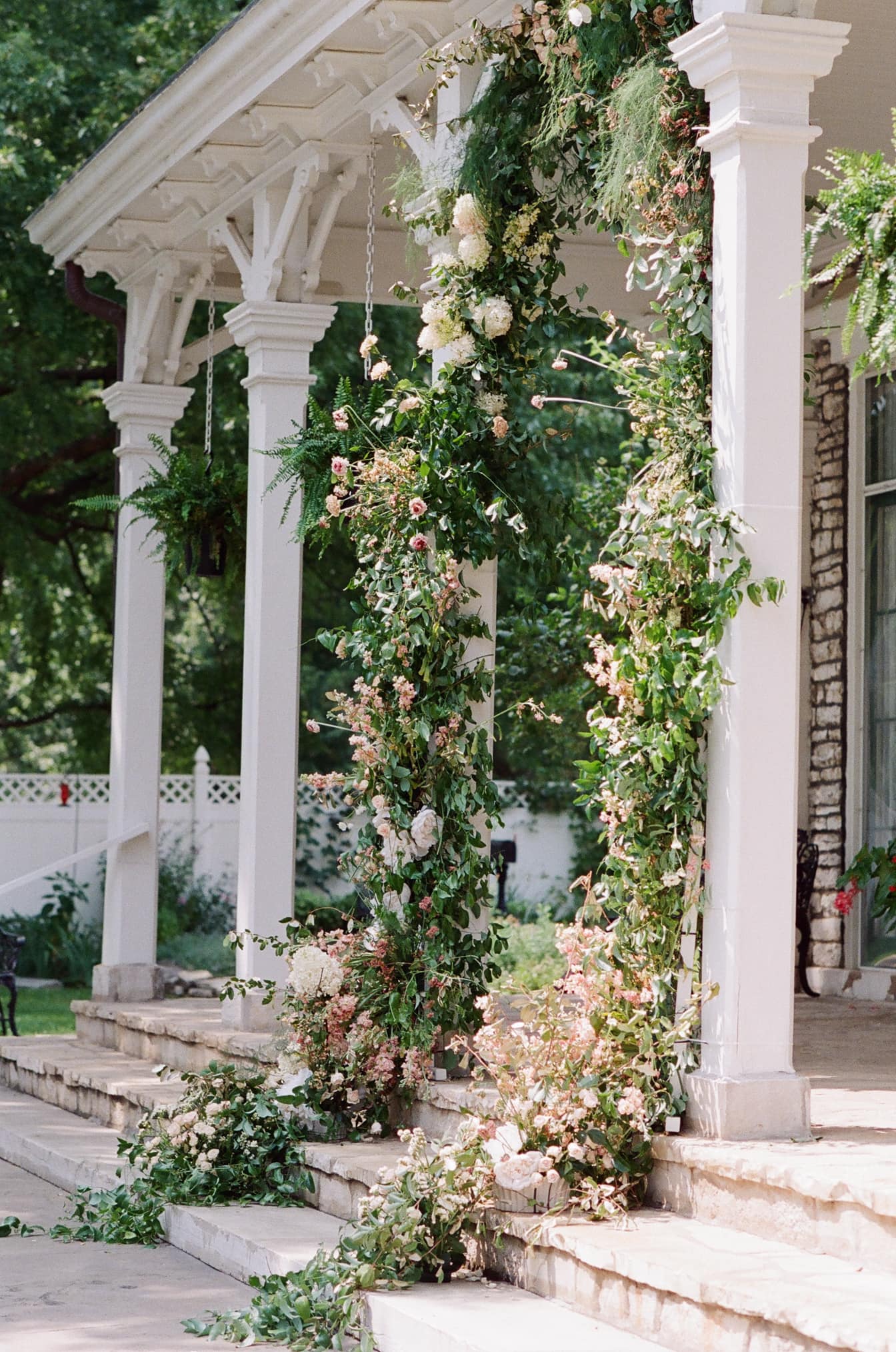 Floral ceremony arch at Oakland House