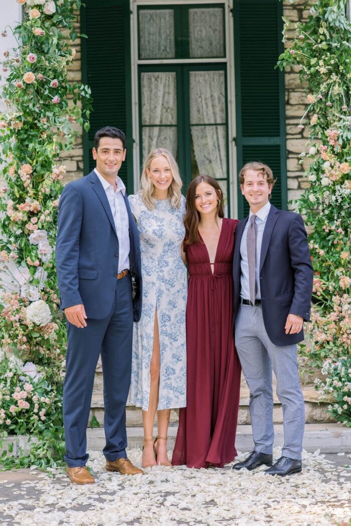 Wedding guests embracing each other at Oakland House