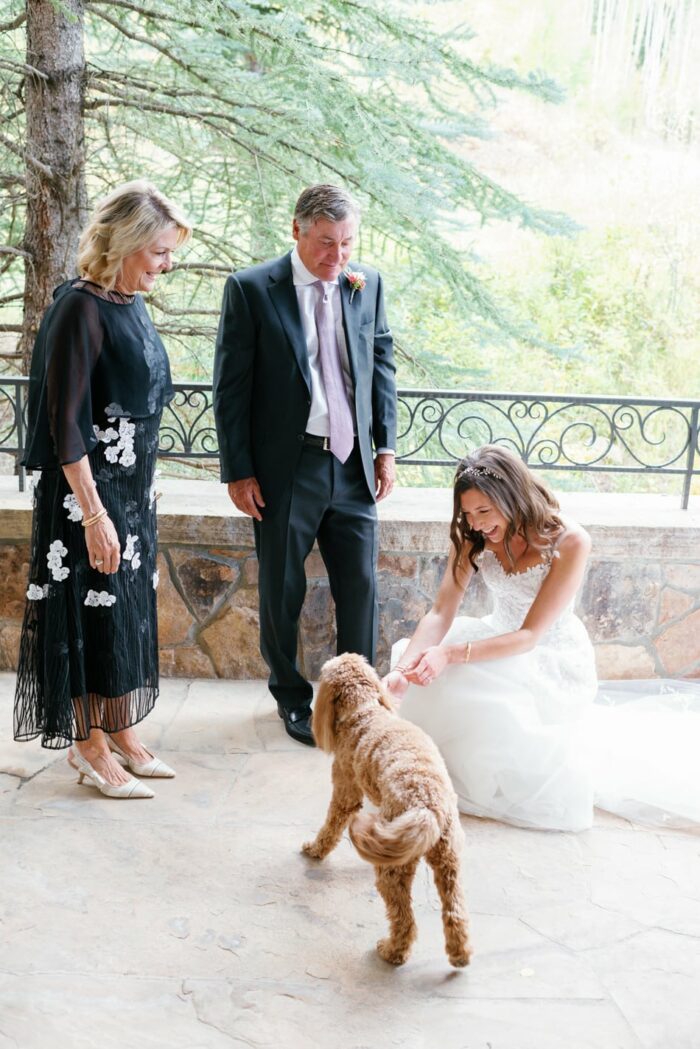 Bride with parents and dog
