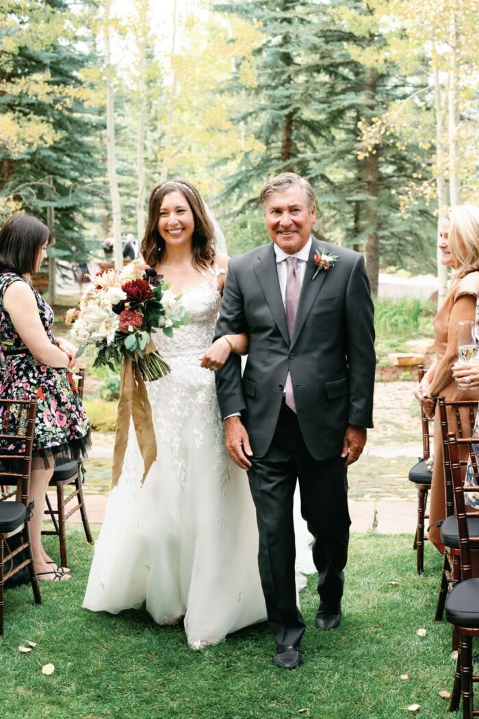 Father of bride walking bride down the aisle