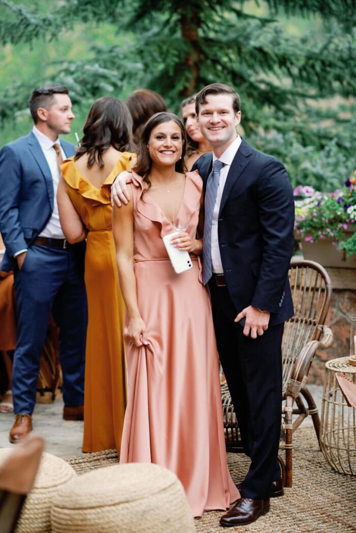 Colorado wedding guests cheering to each other