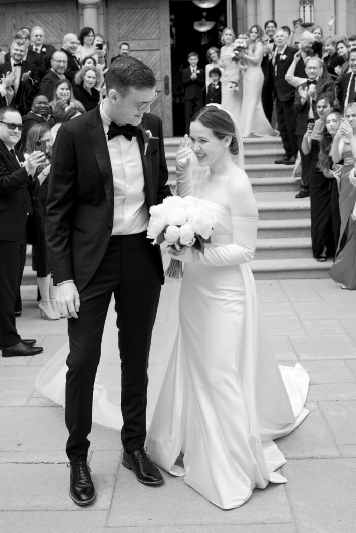 Bride and groom smiling after church wedding
