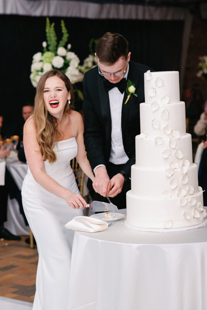 Bride and groom cutting cake at Chicago Botanic Garden