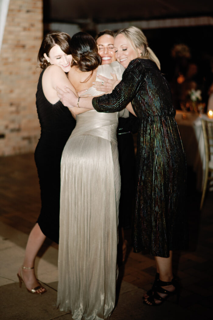 Wedding guests embracing each other