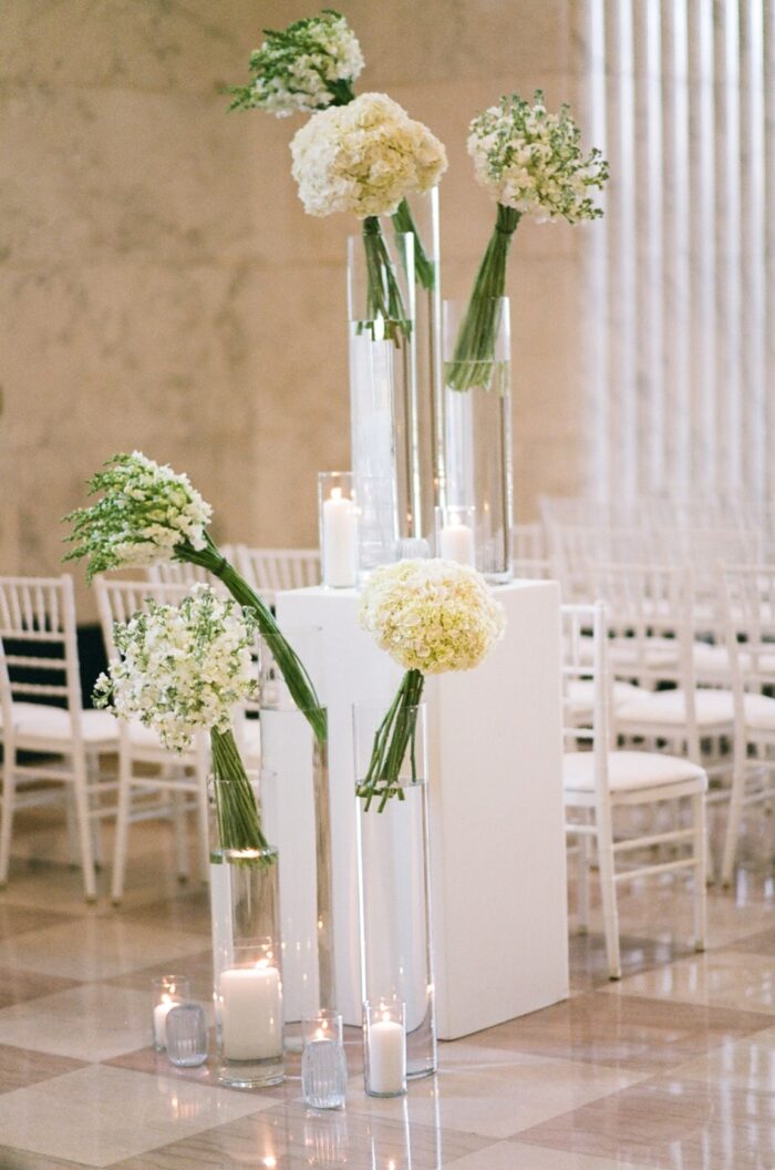 White wedding ceremony florals by HMR Design