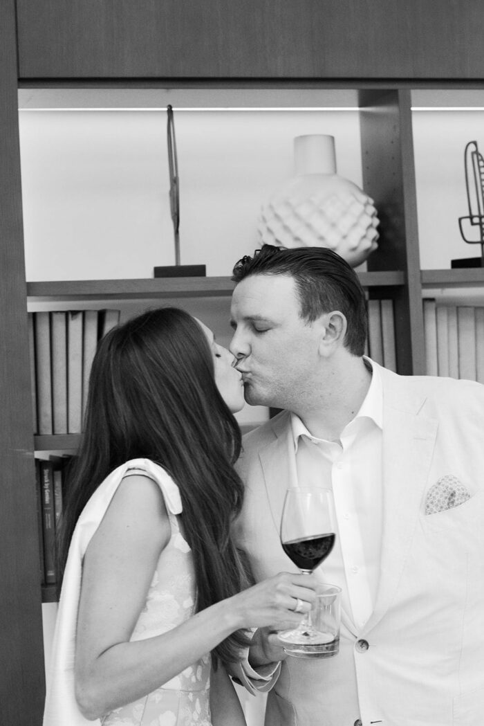 Bride and groom kissing each other during Chicago rehearsal