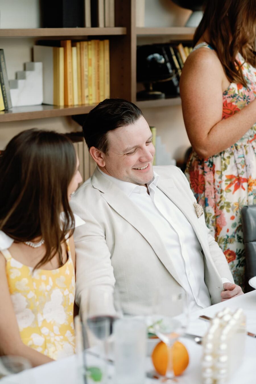 Groom listening to wedding speech