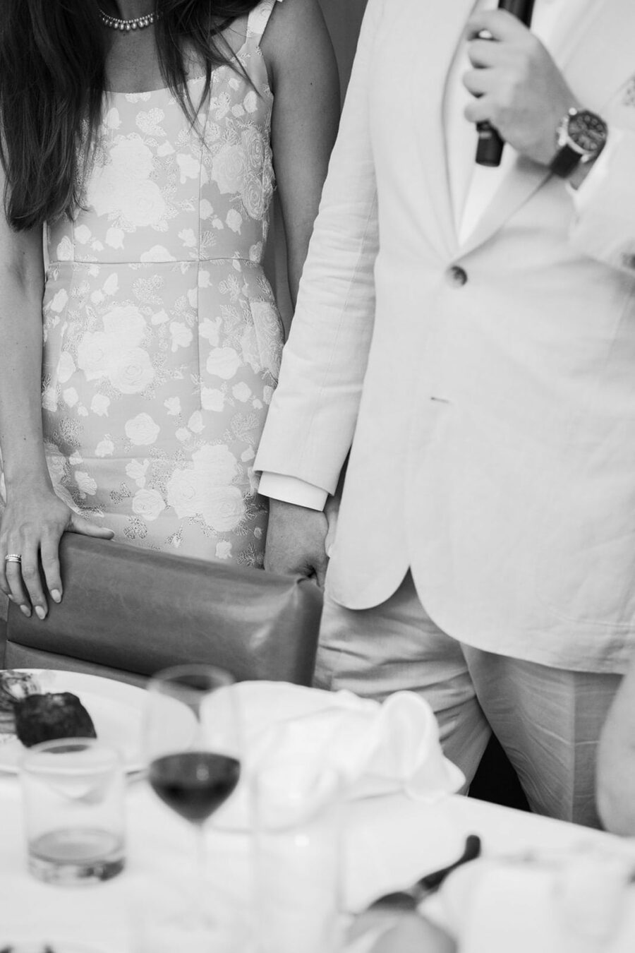 Bride and groom holding hands