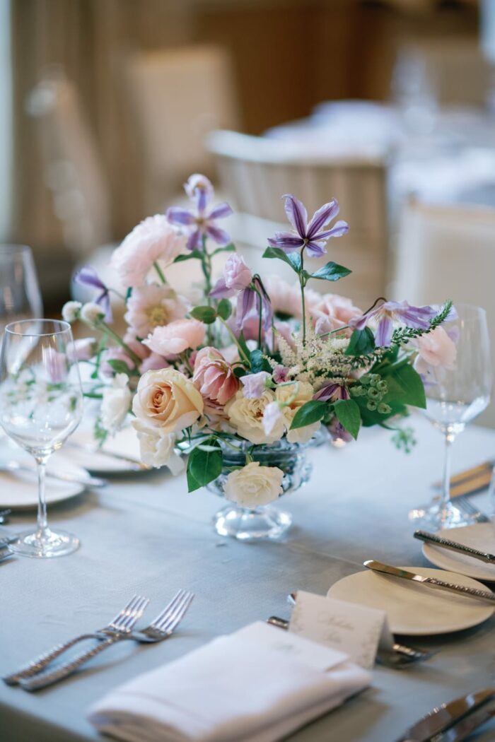 Purple and white wedding florals