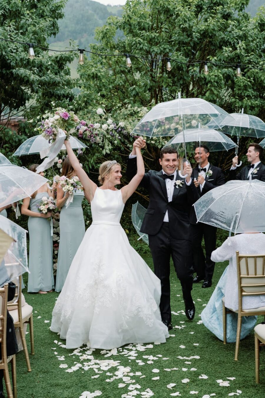 Bride and groom walking down the aisle after their wedding ceremony at Hotel Jerome
