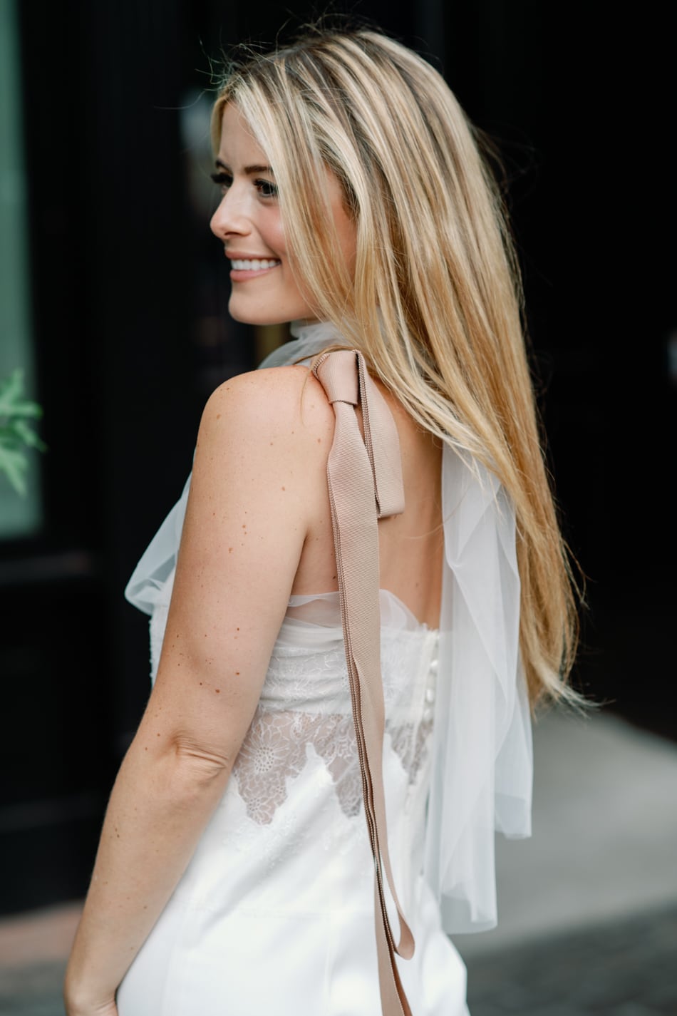 Detail of white jumpsuit from Danielle Frankel Studio