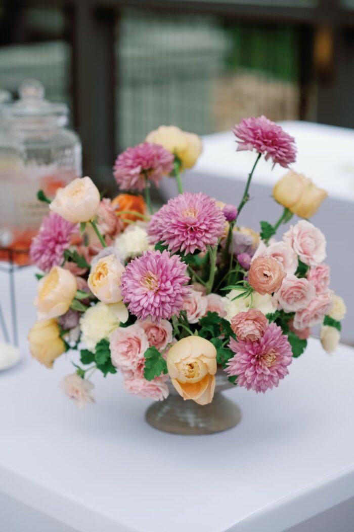 Colorful wedding centerpiece with blushes and pinks