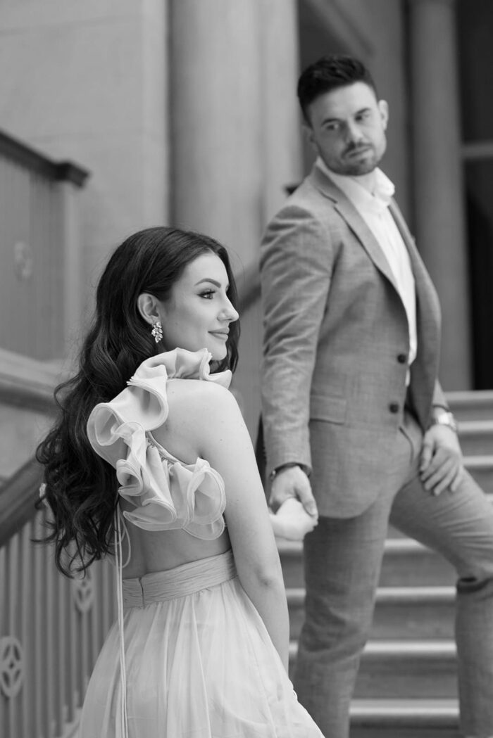 Bride and groom on stairs of Chicago Art Institute