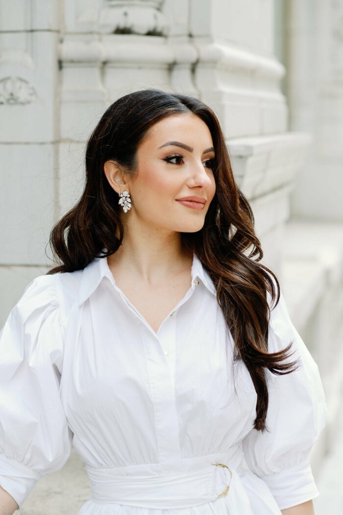 Bride in short white dress at Wrigley Building in Chicago