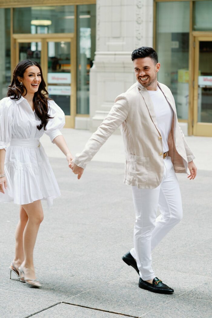 Bride and Groom walking hand in hand in Chicago